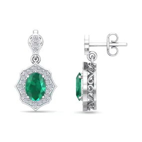 1 3/4 Carat Oval Shape Emerald And Diamond Dangle Earrings In 14 Karat White Gold