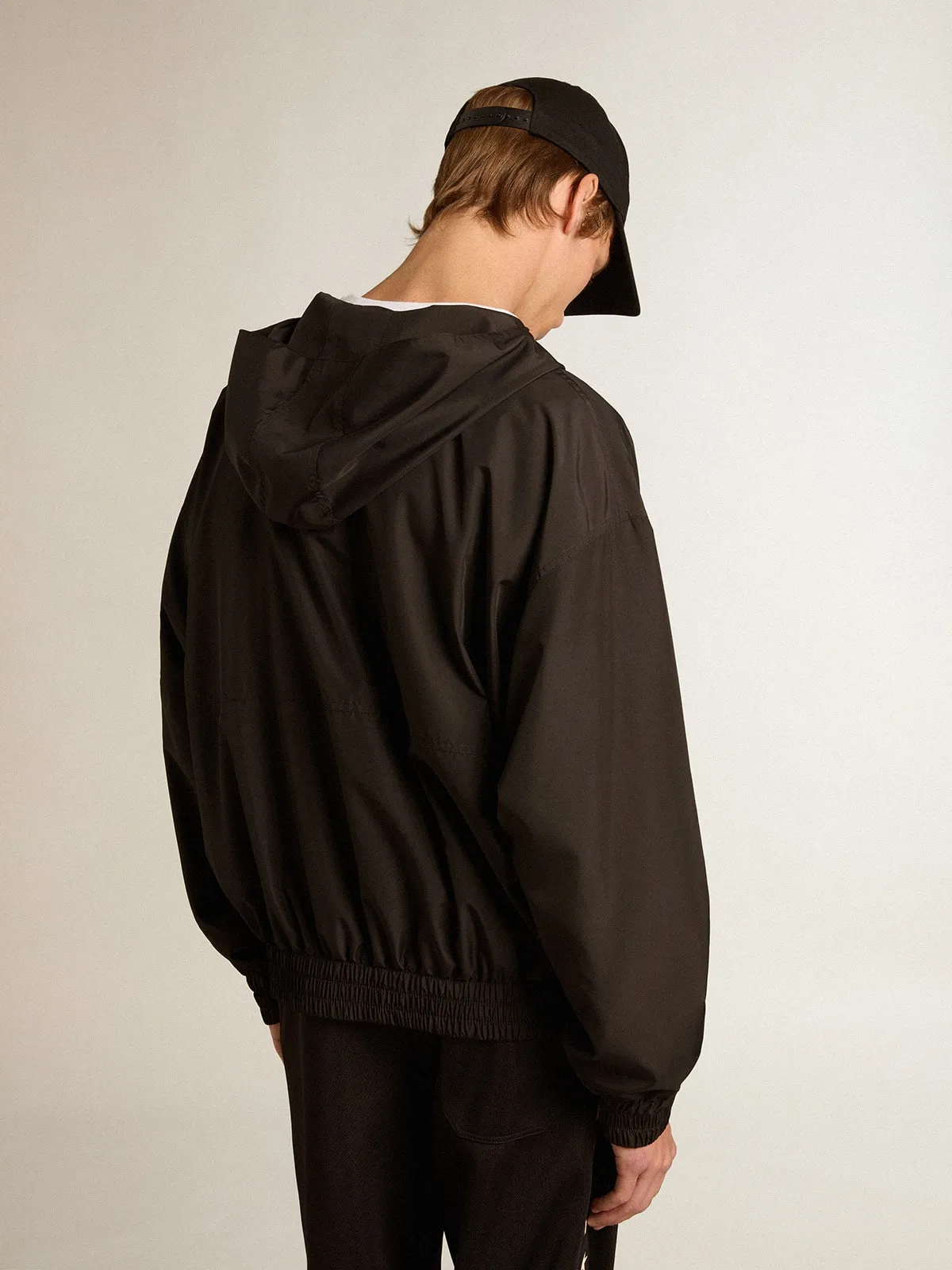 Black windbreaker with hood  